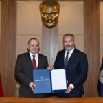 anadolu-universitesi-rektor-yusuf-adiguzel-ve-kav-baskani-mehmet-ulvi-saran-protokol-imza-toreni